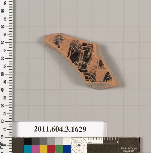Terracotta fragment of a kylix: Band cup (drinking cup)