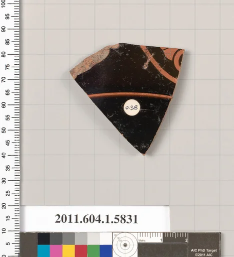 Terracotta fragment of a kylix: eye-cup (drinking cup)