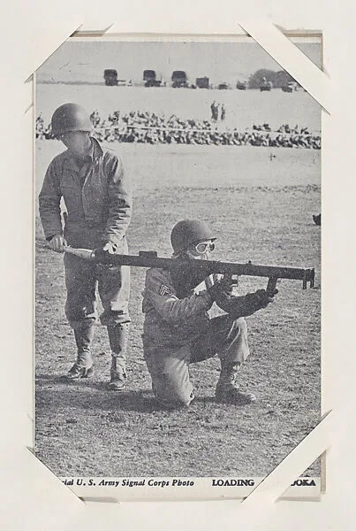 Loading a Bazooka from Military--Official Photos cards (W615) — Unknown