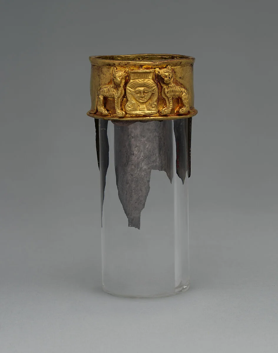 Neck from a vessel depicting the goddess Hathor flanked by felines — Unknown