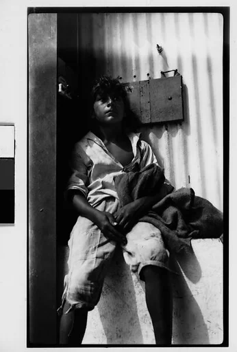 [Boy Seated on Ledge, Havana]