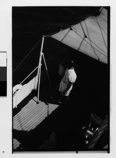 [Four 35mm Film Frames: South Seas: Two Cressida Passengers on Deck, From Above, and Isabelle Jennings on Cressida Prow]
