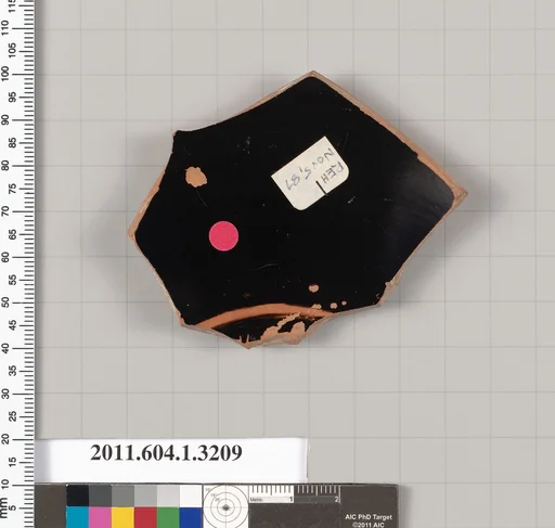 Terracotta fragment of a kylix (drinking cup)