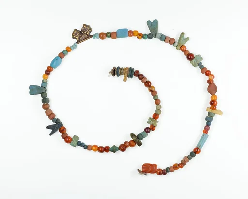 Necklace with fly amulets