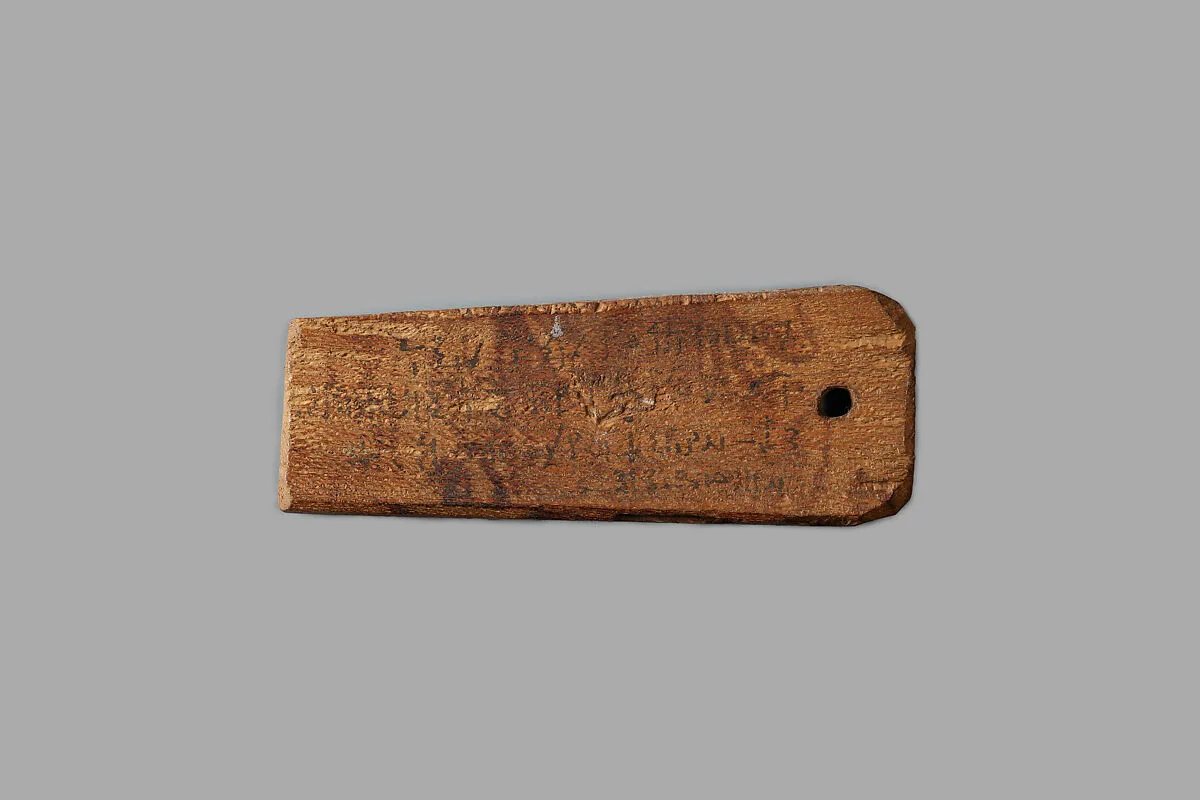 Mummy label of Senpnouthe, daughter of Sulis; her mother Taphiomis — Unknown