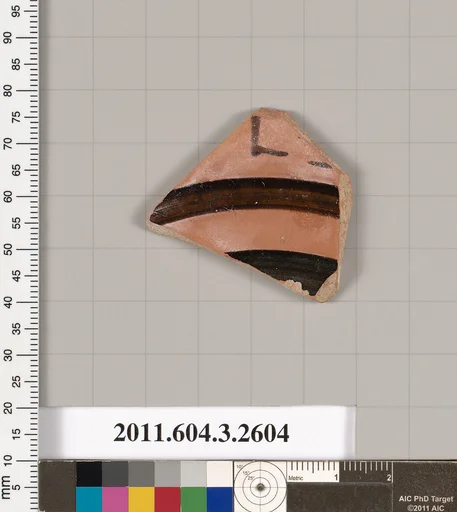 Terracotta fragment of a kylix (drinking cup)