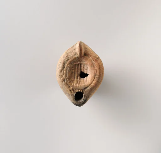 Terracotta oil lamp