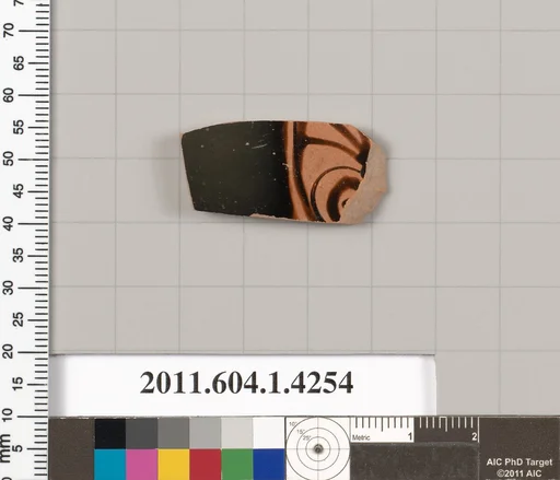 Terracotta fragment of a kylix (drinking cup)