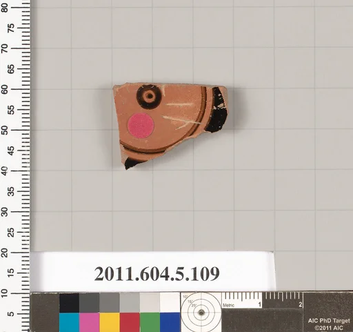 Terracotta fragment of a stemless kylix (drinking cup)