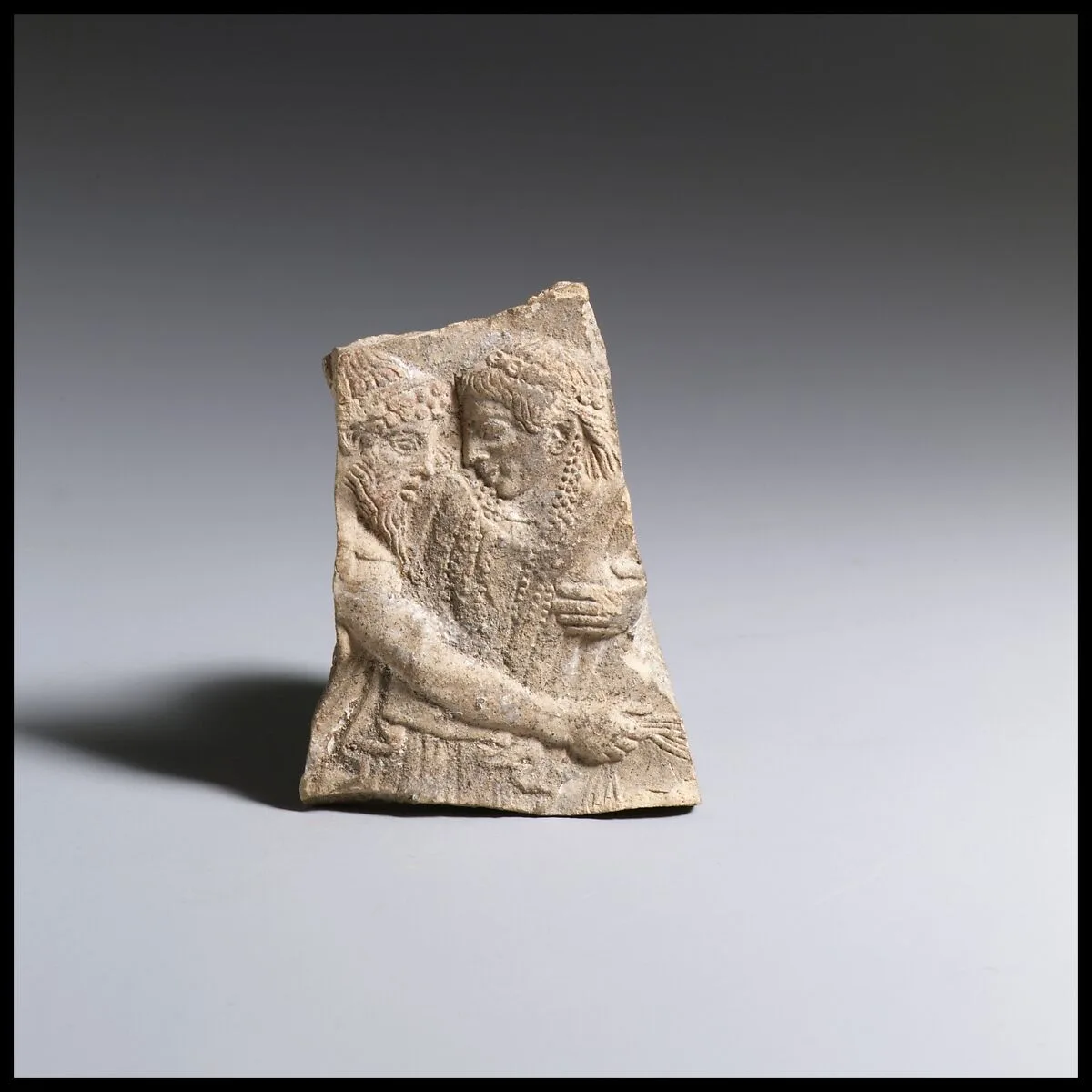 Terracotta fragment of a votive relief — Unknown