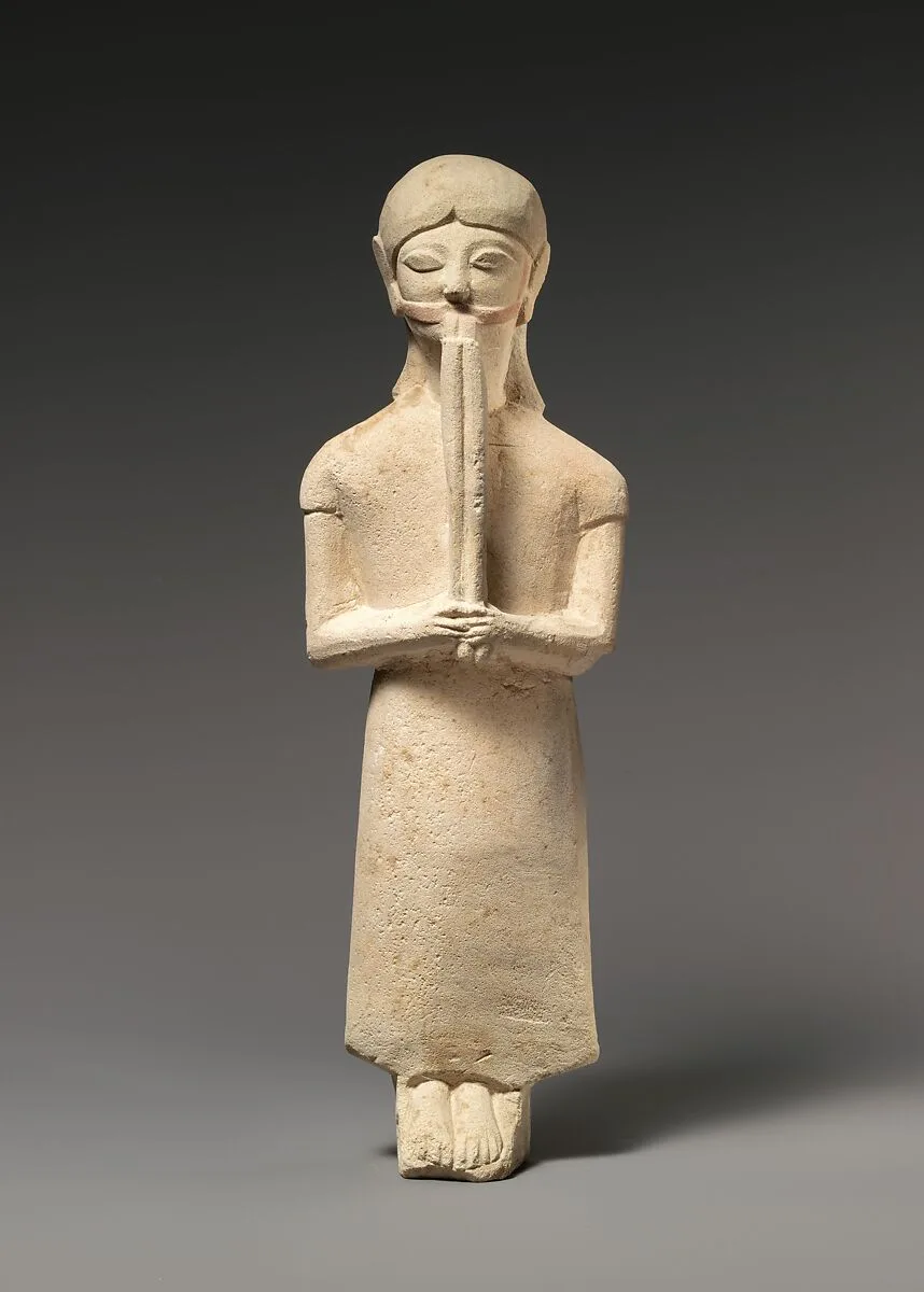 Limestone flute-player — Unknown