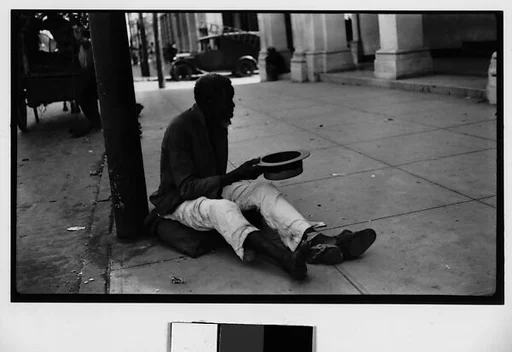 [Beggar Seated on Street, Havana]