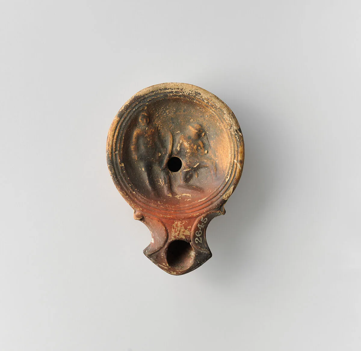Terracotta oil lamp — Unknown