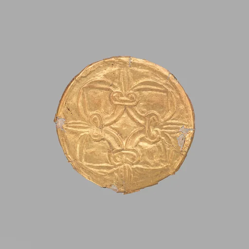 Gold roundel with stamped designs