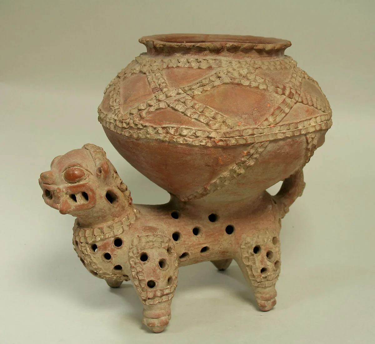 Bowl Resting on Jaguar — Unknown