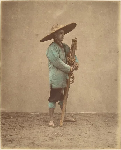 [Chinese Man Wearing Hat]