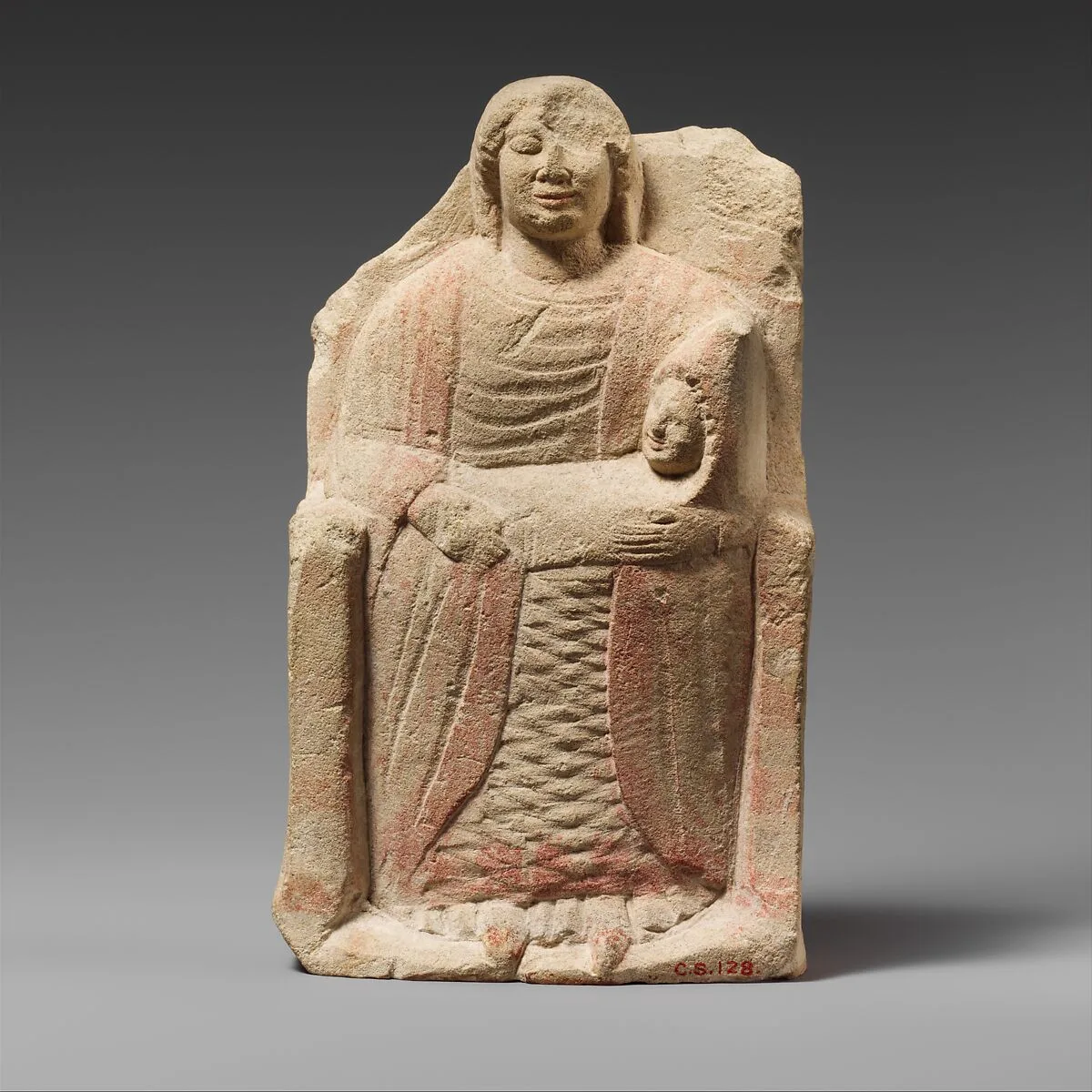 Seated limestone kourotrophos — Unknown