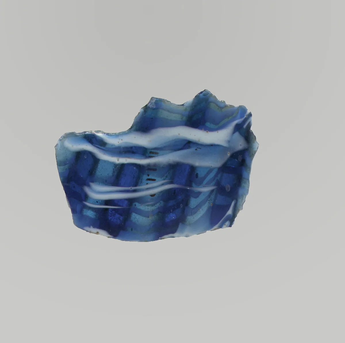 Glass mosaic ribbed bowl fragment — Unknown
