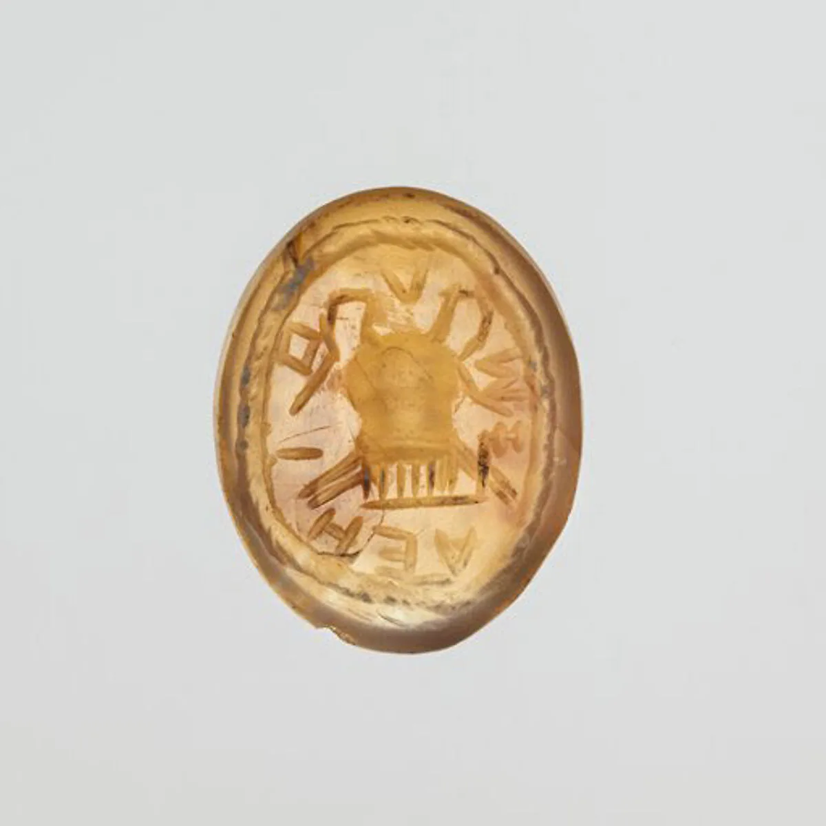 Agate intaglio: Uterine symbol — Unknown