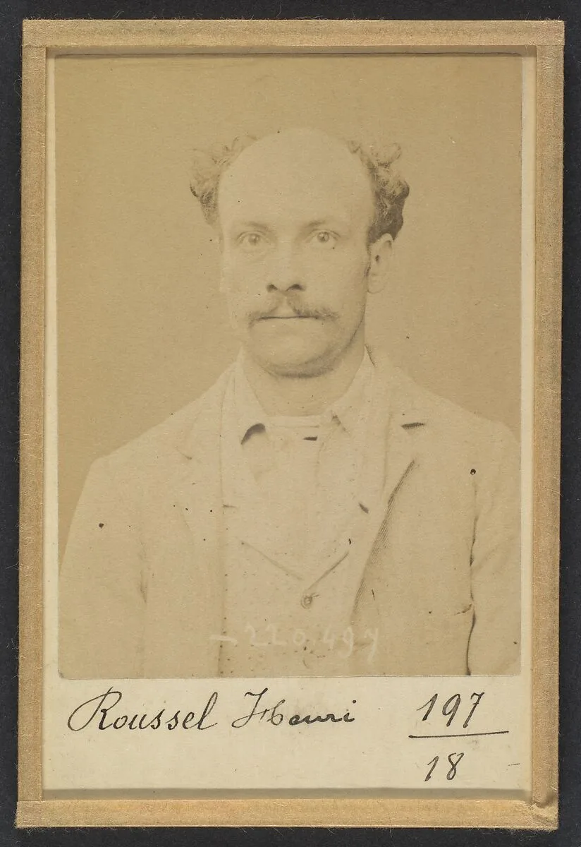 Roussel. Henri-Louis. 28 ans, né à Paris le 2/10/65. Ardoiseur. Anarchiste. 2/7/94. — Alphonse Bertillon