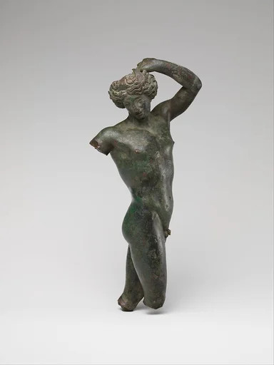 Bronze statuette of a youth dancing