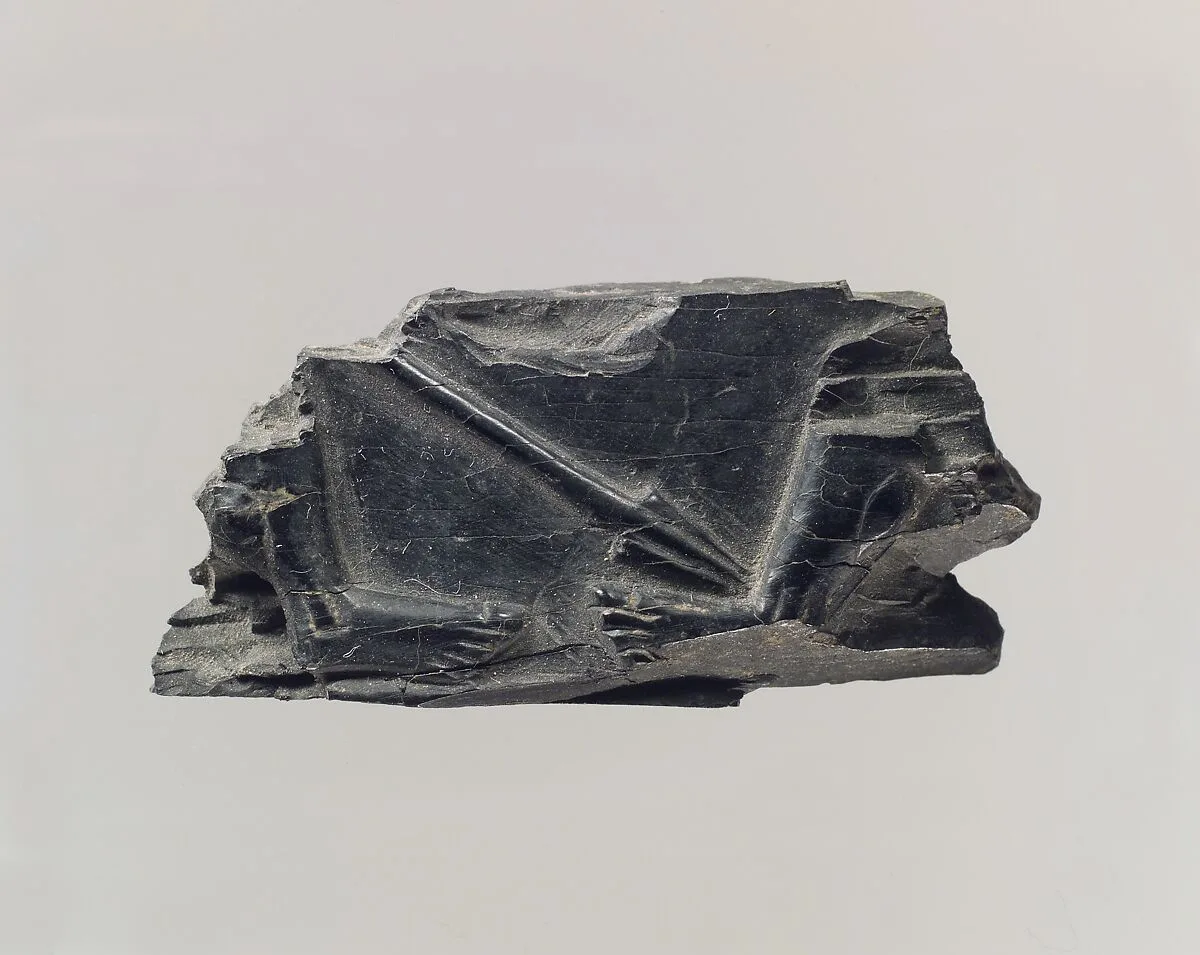 Furniture plaque carved in relief with spear — Unknown