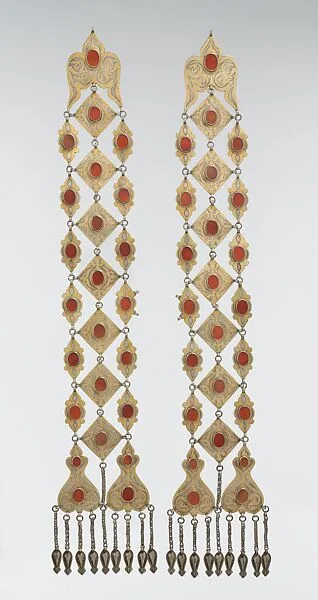 Dorsal Plait Ornament, One of a Pair — Unknown
