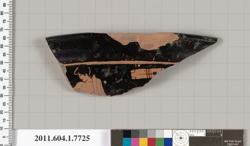 Terracotta rim fragment of a kylix (drinking cup)