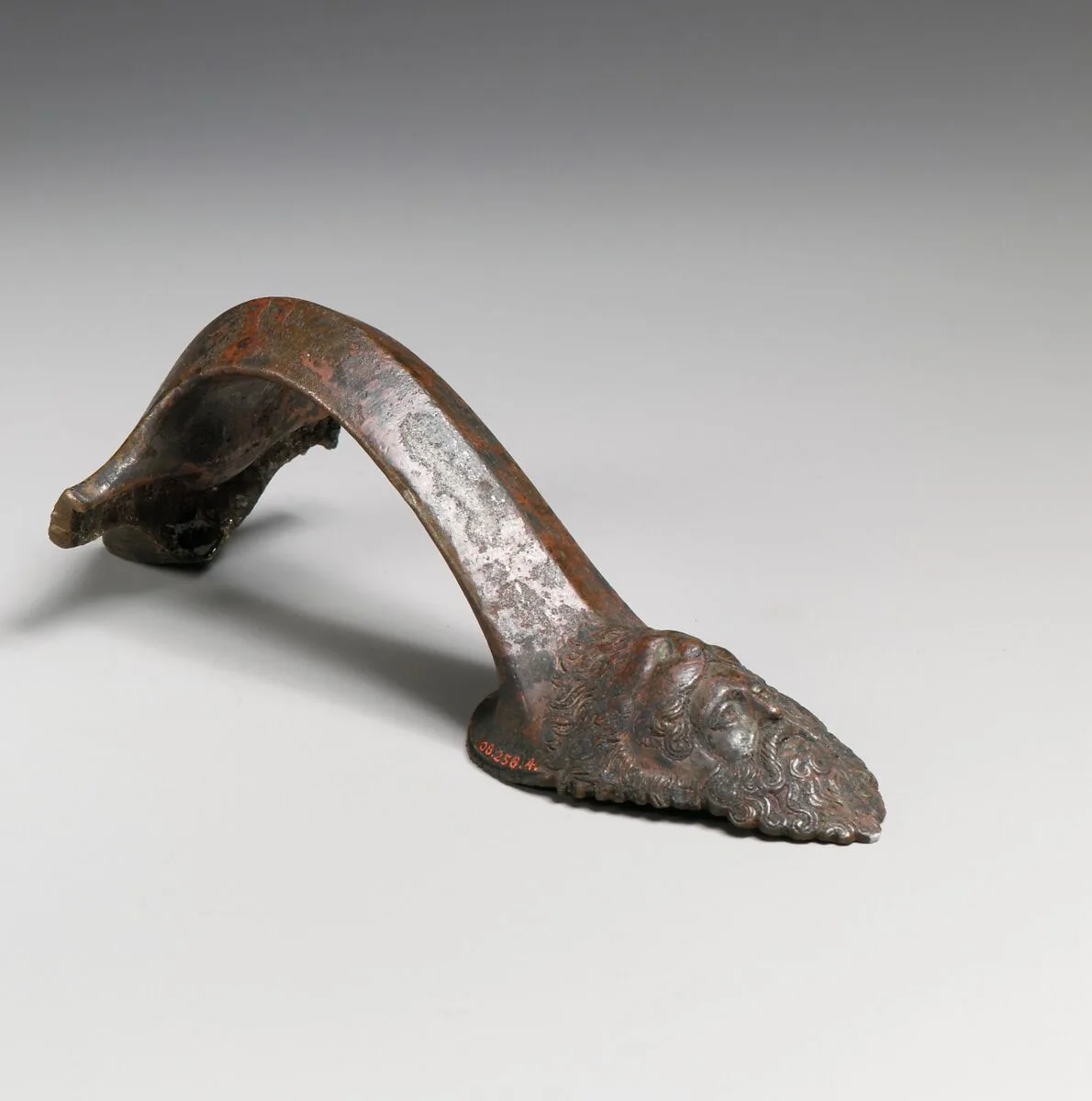 Bronze handle of an oinochoe (jug) — Unknown