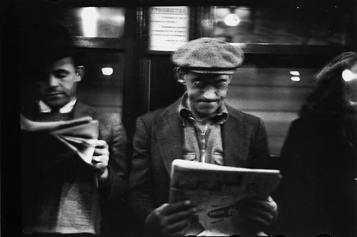 [Five 35mm Film Frames: Subway Passengers, New York City: Two Men Reading Newspapers, Mother and Son, Woman in Front of Transit Authority Poster]