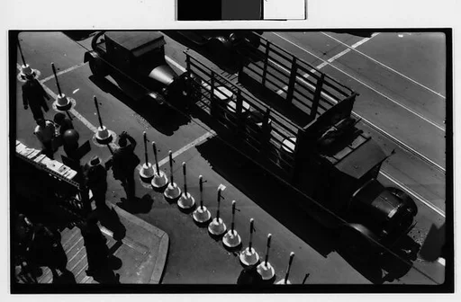 [Pedestrians and Automobiles on Street Outside Borough Hall Subway Entrance, From Above, Brooklyn, New York]