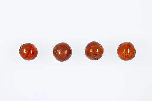 Round beads from the mummy of Ukhhotep