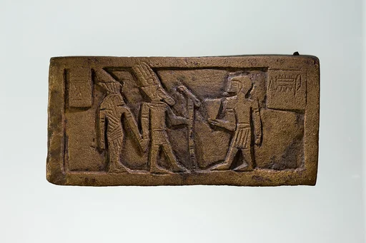 Part of a bronze statue base inscribed in Egyptian and Greek