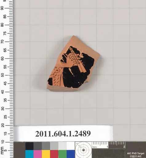 Terracotta fragment of a kylix (drinking cup)