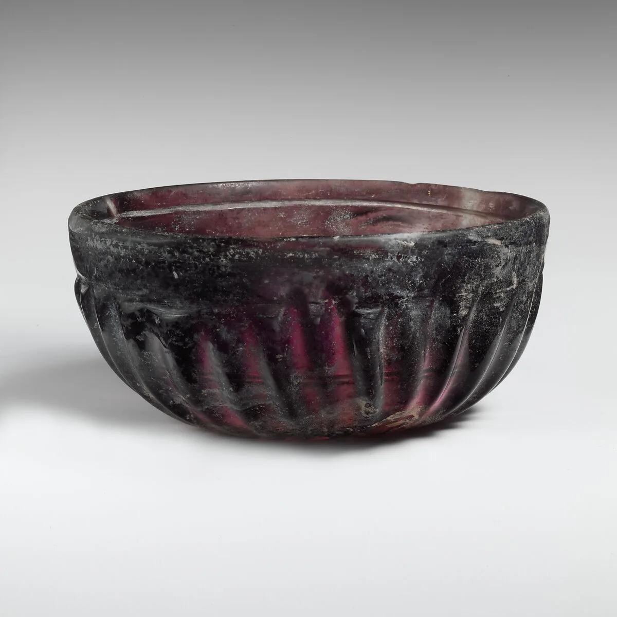 Glass ribbed bowl — Unknown