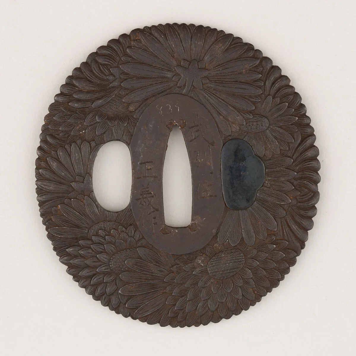 Sword guard (<i>Tsuba</i>) With Chrysanthemum Motif (菊花図鐔) — Masayoshi