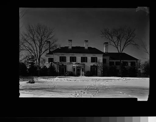 [Brick House with Circular Entry Porch, From Across Lawn]