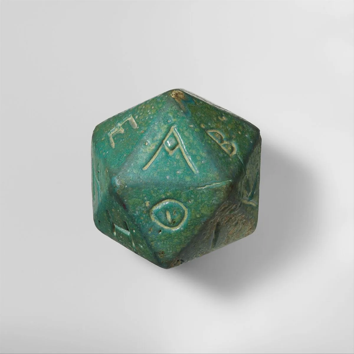Faience polyhedron inscribed with letters of the Greek alphabet — Unknown