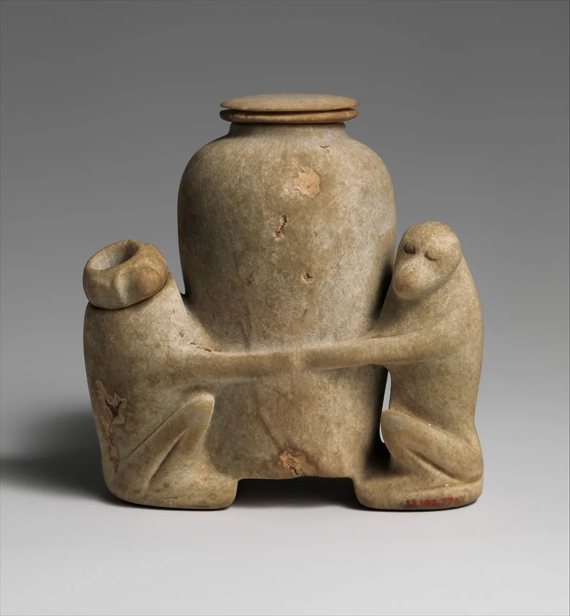 Ointment vessel in the shape of two baboons holding a jar — Unknown