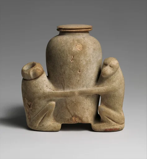 Ointment vessel in the shape of two baboons holding a jar