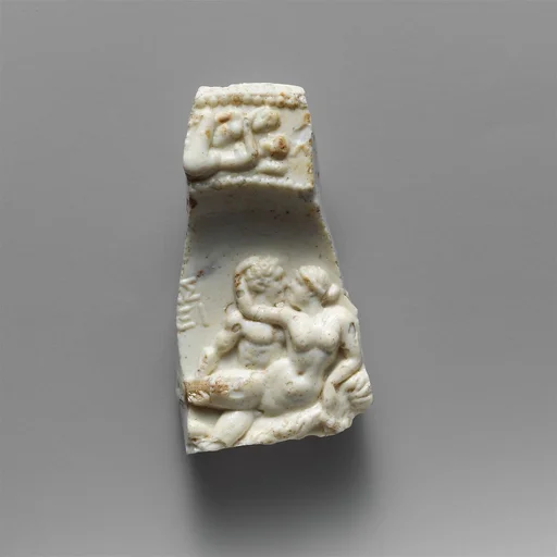 Glass bowl fragment with erotic scenes