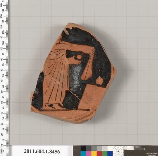 Terracotta fragment of a stemless kylix (drinking cup)