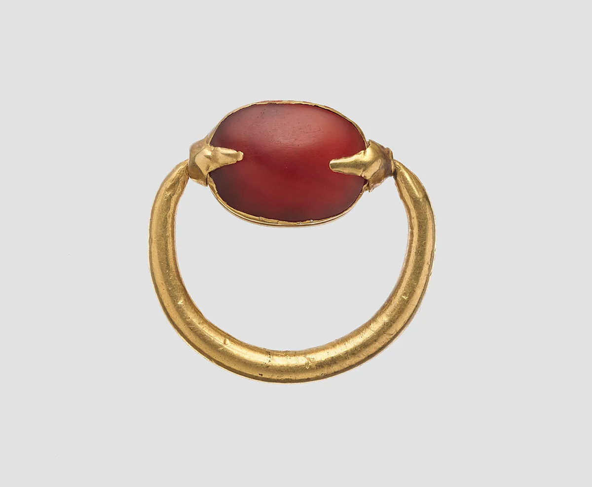 Gold and carnelian scaraboid ring — Unknown