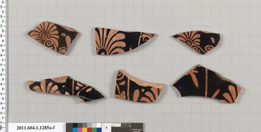 Terracotta fragments of kylikes (drinking cups)