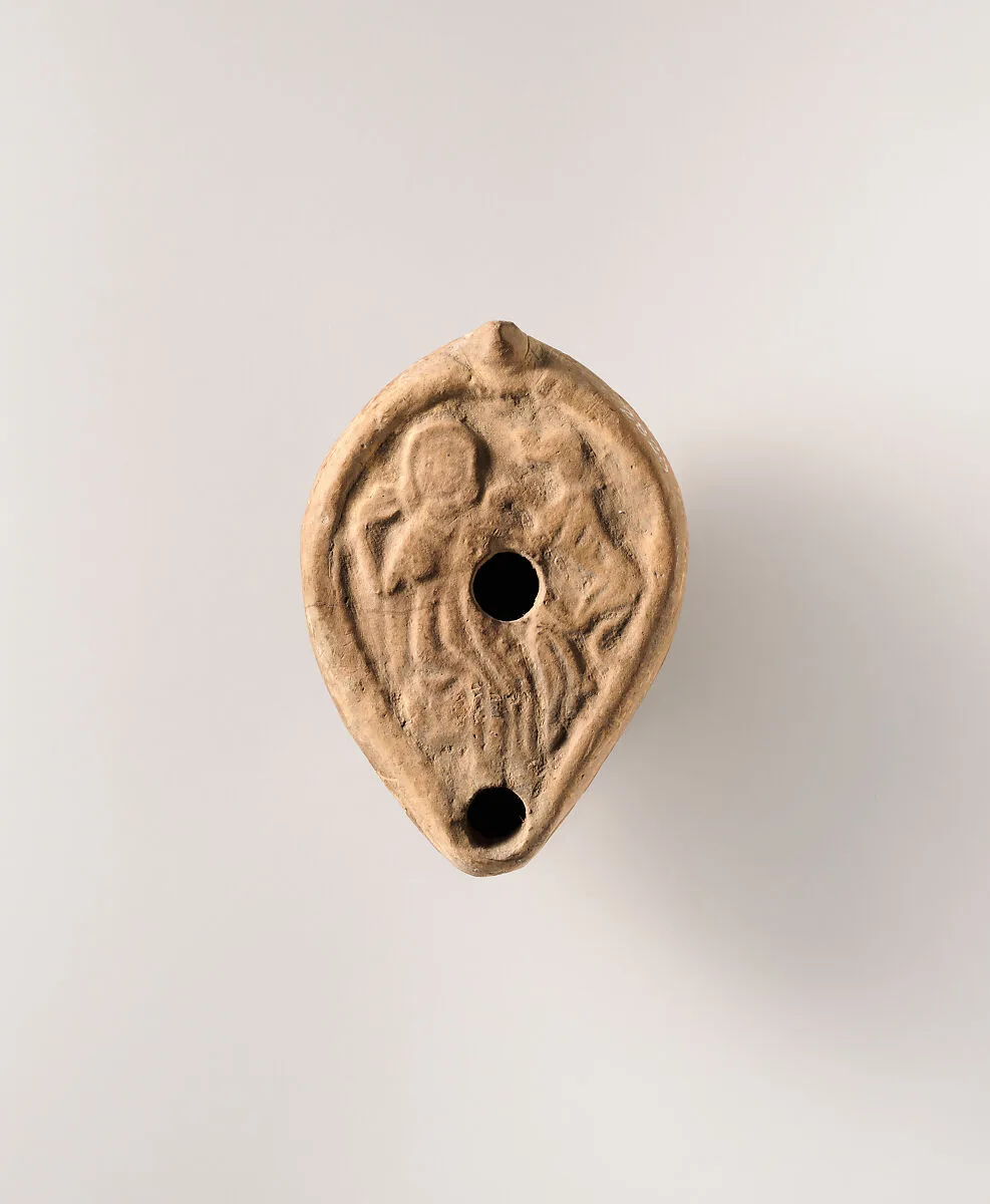 Terracotta oil lamp — Unknown