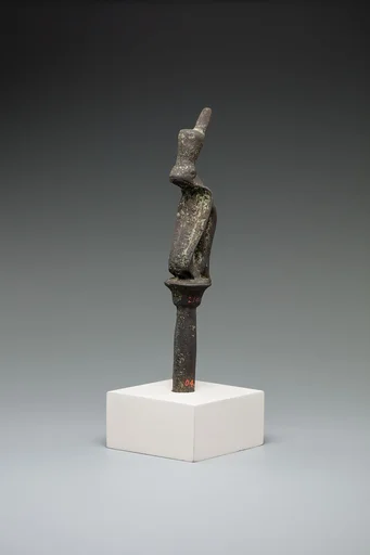 Cobra wearing red crown on a papyrus stem