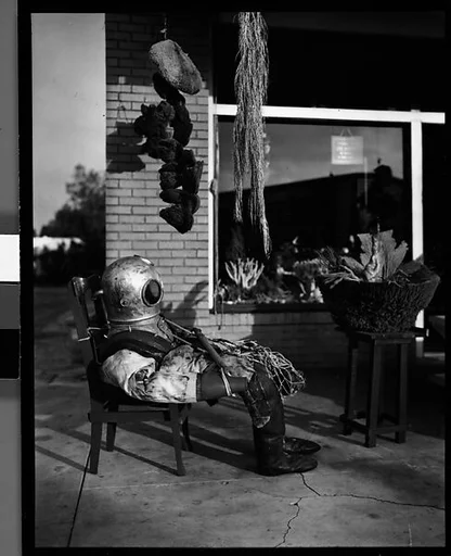[Sponge Diver's Suit in Front of Mermaid Curio Shoppe, Florida]
