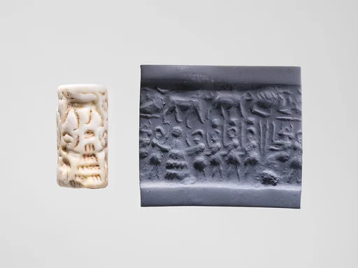 Cylinder seal and modern impression: seated goddess before figures carrying boxes, one placed on "altar"