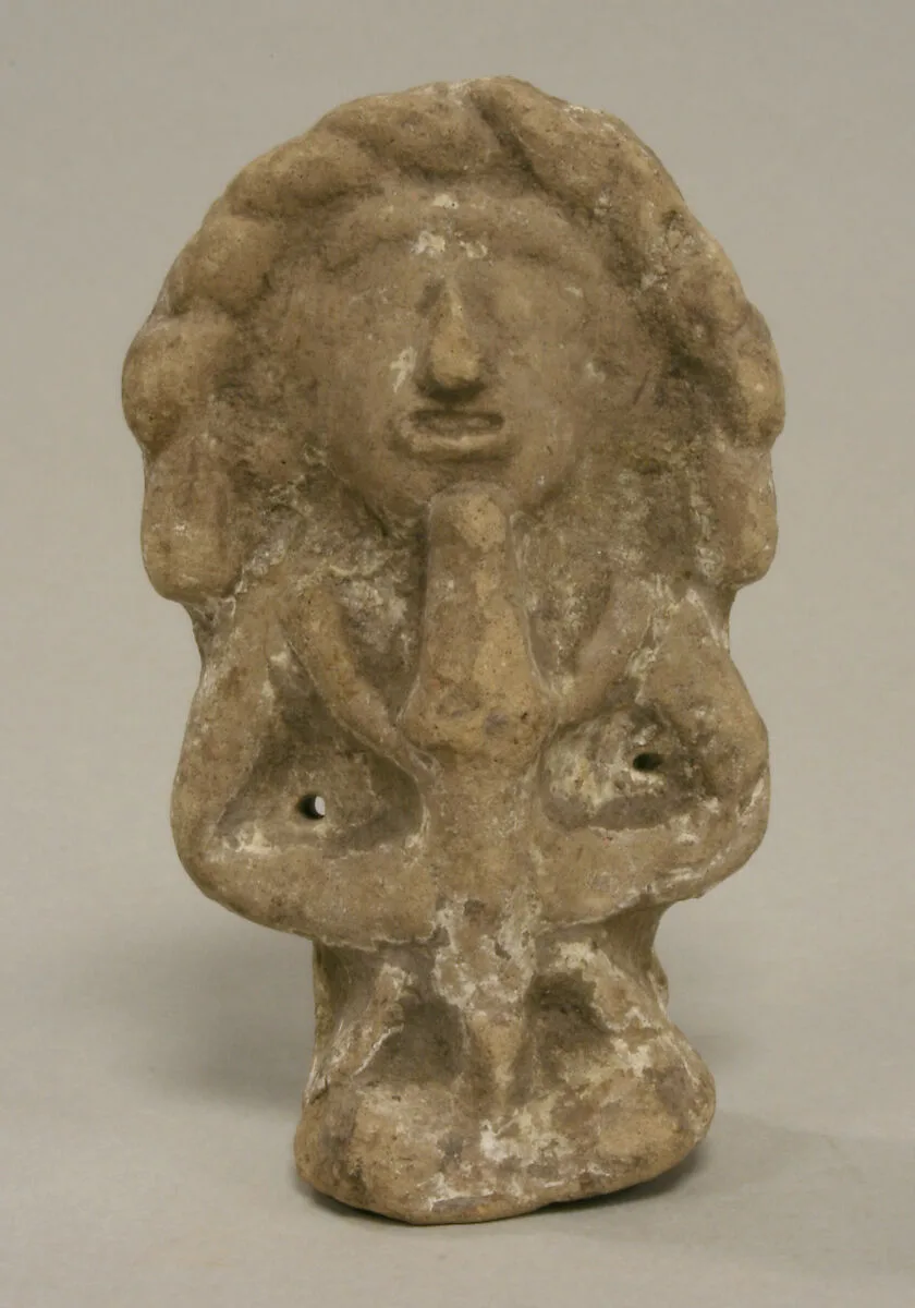 Kneeling Female Figure — Unknown
