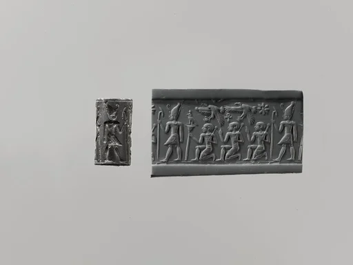 Cylinder seal and modern impression: pharaoh wearing Double Crown, kneeling figures below vultures holding shn symbols; ankh